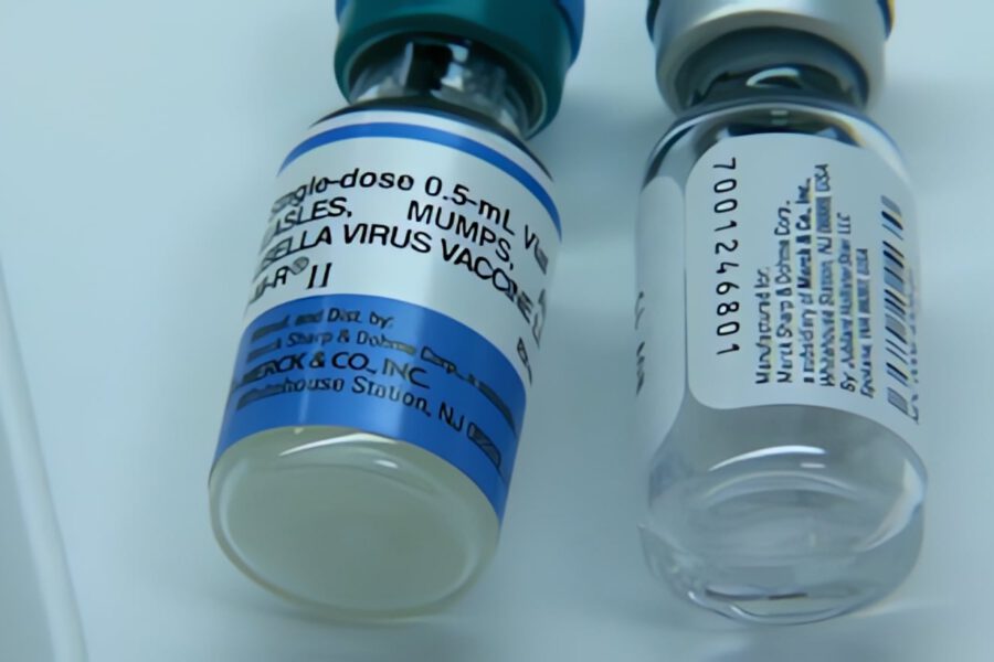 Close-up image of two MMR vaccine vials for measles, mumps, and rubella.