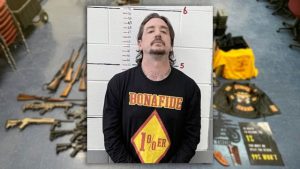 Mugshot of Andrew Burdett Moore, 37, federally indicted for child pornography; weapons and gang memorabilia seized during Lamesa arrest.