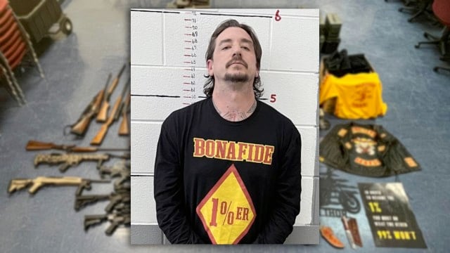 Mugshot of Andrew Burdett Moore, 37, federally indicted for child pornography; weapons and gang memorabilia seized during Lamesa arrest.