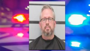 Mugshot of Joshua Weston, 41, former Lubbock dealership manager accused of stealing over $200,000 and deleting valuable business data.