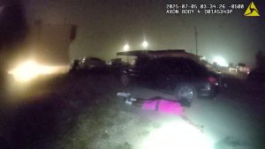 Body camera footage showing suspect lying on the ground after officer-involved shooting on July 5, 2025, in Lubbock, Texas.