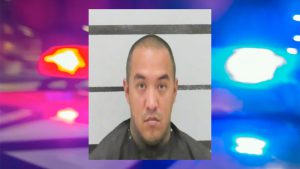 Mugshot of Lubbock man arrested on 17 charges after police found multiple switch conversion kits for firearms during traffic stop.
