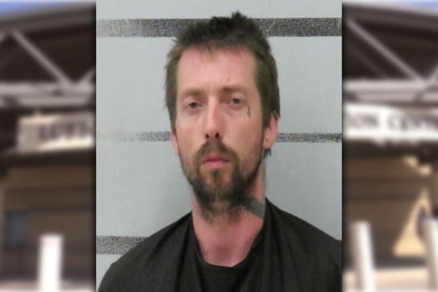 Booking photo of Dustin Arnold, 36, arrested in Lubbock on charges of indecency with a child after alleged abuse from 2020 to 2023.