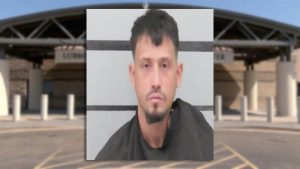 Mugshot of Gerardo Alejandro Mata, arrested in Lubbock for indecency with a child, displayed against Lubbock County Detention Center background.
