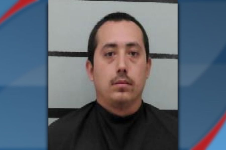 Mugshot of John Jimenez Jr., 26, arrested in Lubbock for robbery, violating a restraining order, and multiple related charges.