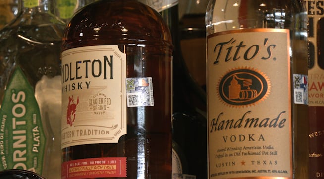 Bottles of alcohol including Tito’s Handmade Vodka and Pendleton Whisky, used in a report about rising juvenile alcohol offenses in Lubbock, Texas.