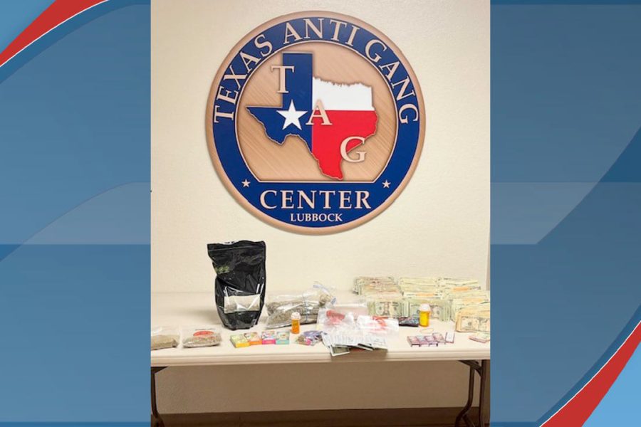Evidence displayed at the Texas Anti-Gang Center in Lubbock, including seized drugs, cash, and paraphernalia, following multiple arrests during a September 2025 search warrant.