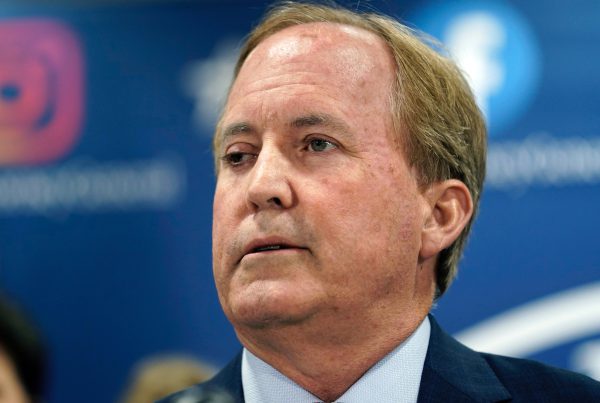 Texas Attorney General Ken Paxton speaking at a press conference ahead of his appearance at a Turning Point USA event in Lubbock.