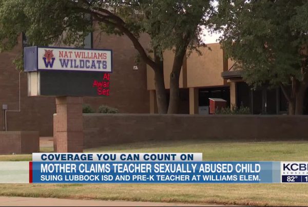 Nat Williams Elementary School sign in Lubbock, Texas, shown in news coverage of lawsuit alleging a Pre-K teacher sexually abused a 3-year-old student.