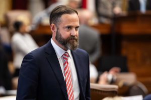 Texas House Speaker Dustin Burrows stands in the state Capitol during a legislative session, facing possible censure under the Texas GOP’s new Rule 44.
