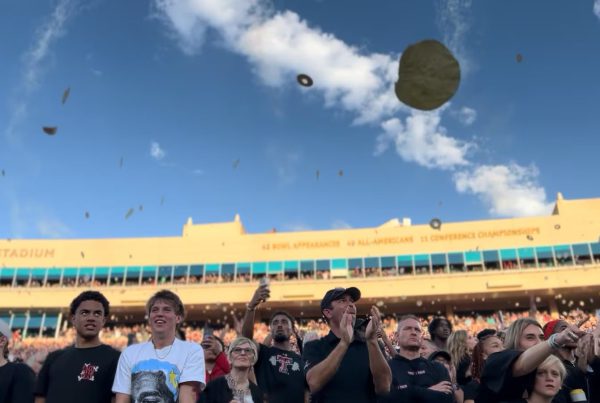 Texas Tech fans at Jones AT&T Stadium toss tortillas into the air during a football game, continuing the university’s iconic and controversial game-day tradition.