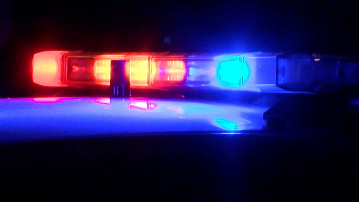 Flashing red and blue lights from a Lubbock Police Department vehicle at night.