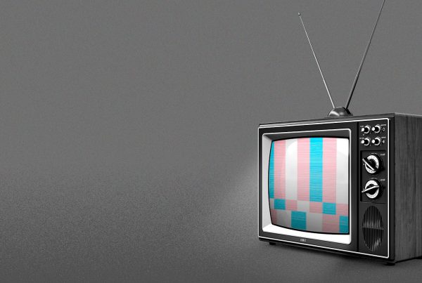 Vintage television showing static color bars against a gray background, symbolizing media blackout and consolidation issues in Lubbock.