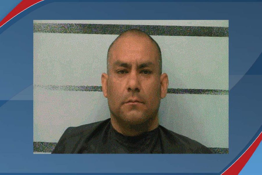 Booking photo of Victor Yannis Jr., shown against a striped background after his 2022 Lubbock carjacking arrest.