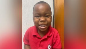 Smiling portrait of Cornelius Carrington, a 4-year-old Lubbock child remembered by his family after his death in a 2021 drive-by shooting.