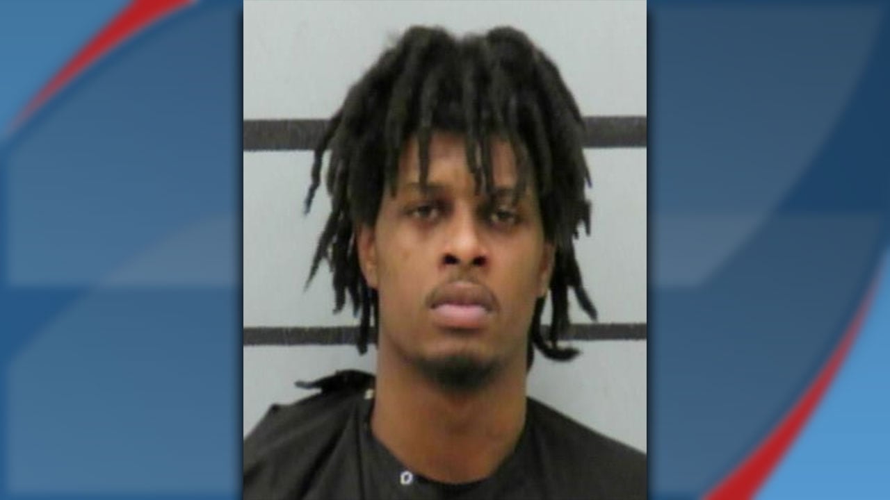 Mugshot of Kesjon Reed in Lubbock County Detention Center after arrest for aggravated assault.