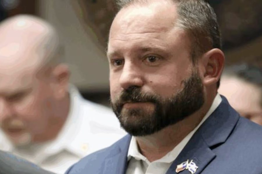 Precinct 2 County Commissioner Jason Corley looking serious during a Lubbock commissioners meeting amid controversy over an early congressional campaign announcement.