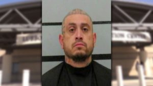 Mugshot of Manuel Rosales, arrested in Lubbock in December 2025, shown against a police booking background.