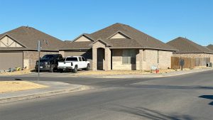 Single-story brick home near 21st Street and Rochester Avenue in West Lubbock where a fatal Friday night shooting occurred.