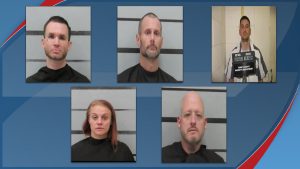 A collage of five mugshots featuring the defendants of a Lubbock drug-trafficking ring, including Adam Baber, Jessica Clauson, Sean Burns, Charles Srnek, and Kiyle Jackson, against grey and white jail backgrounds.
