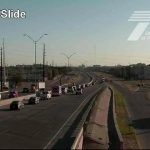 Welcome to the World! Now Here’s Your Speeding Ticket and a View of the Slide Road Overpass