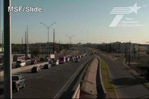 Welcome to the World! Now Here’s Your Speeding Ticket and a View of the Slide Road Overpass