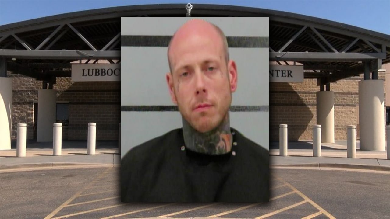 A mugshot of Joshua Wood, a bald man with prominent neck tattoos and light eyes, superimposed over the entrance of the Lubbock County Detention Center.