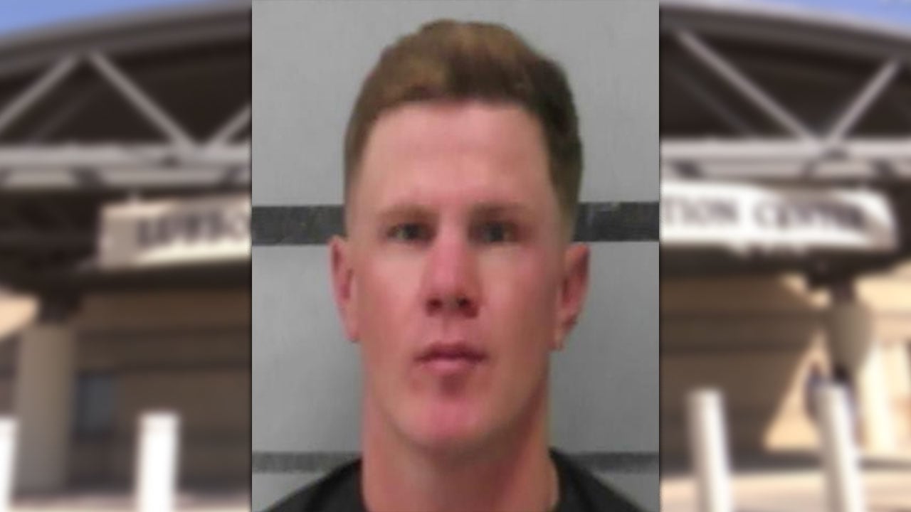 A mugshot of Seth Moore, a man with short blonde hair and a blank expression, appearing over a blurred background of the Lubbock County Detention Center.