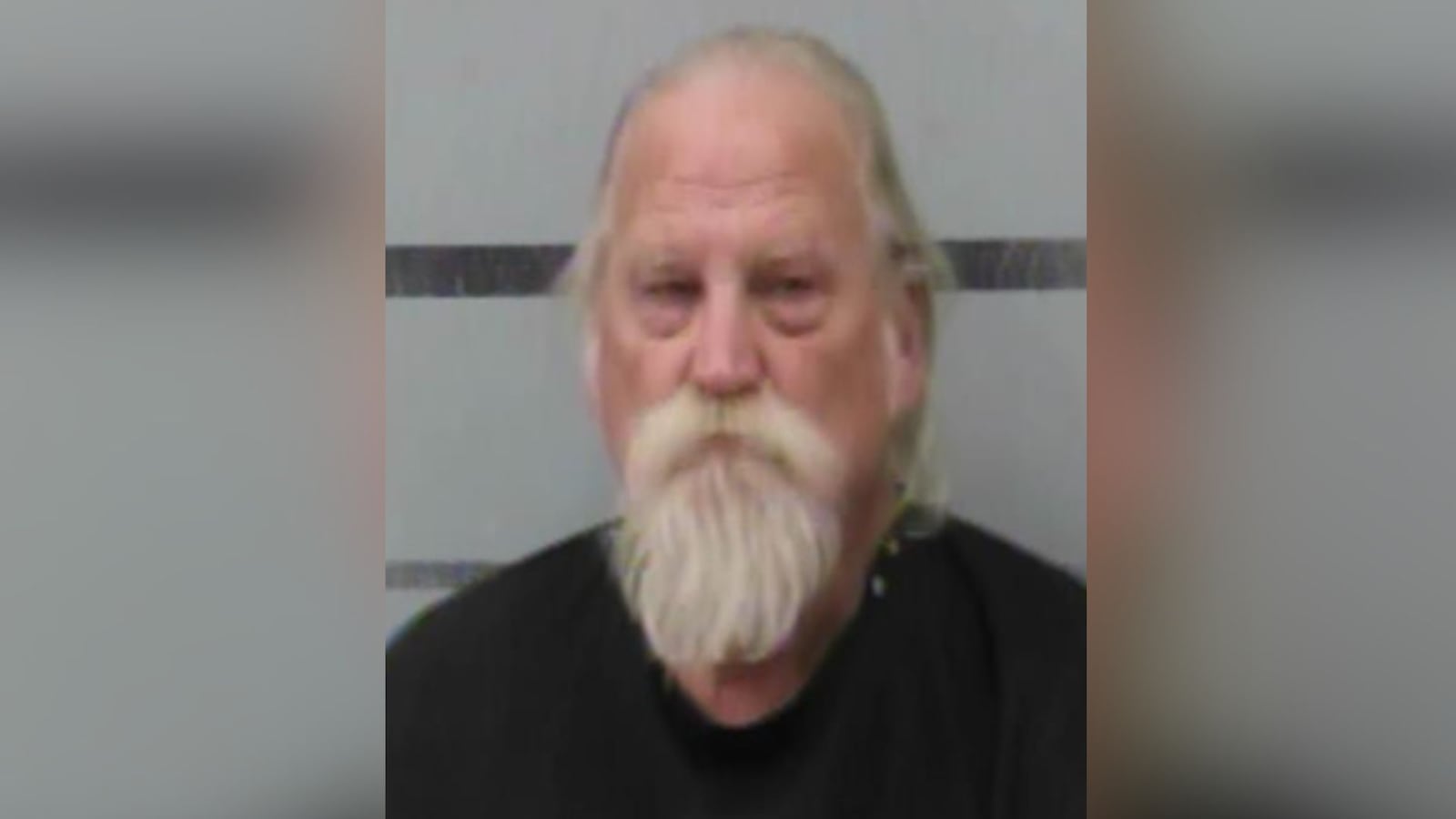A police booking photograph (mugshot) of 74-year-old Steven Glenn Ryals, also known as "Hot Tub," the Lubbock Bandidos chapter president charged with federal meth distribution. He has long light-colored hair and a prominent, bushy white goatee.