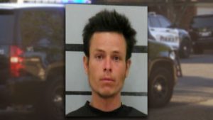 A mugshot of Judah Hew, sporting a "just chased by a mob down Baylor Street" hairstyle and the vacant stare of a man who actually thought the "I thought she was my girlfriend" defense would work after crawling under a public bathroom stall at Amigos.