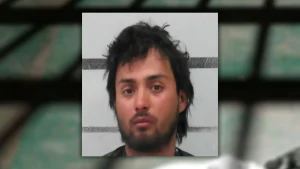 Alec Isaiah Banda’s mugshot, showcasing a masterclass in glassy-eyed indifference after allegedly treating a Lubbock intersection like a game of Grand Theft Auto.