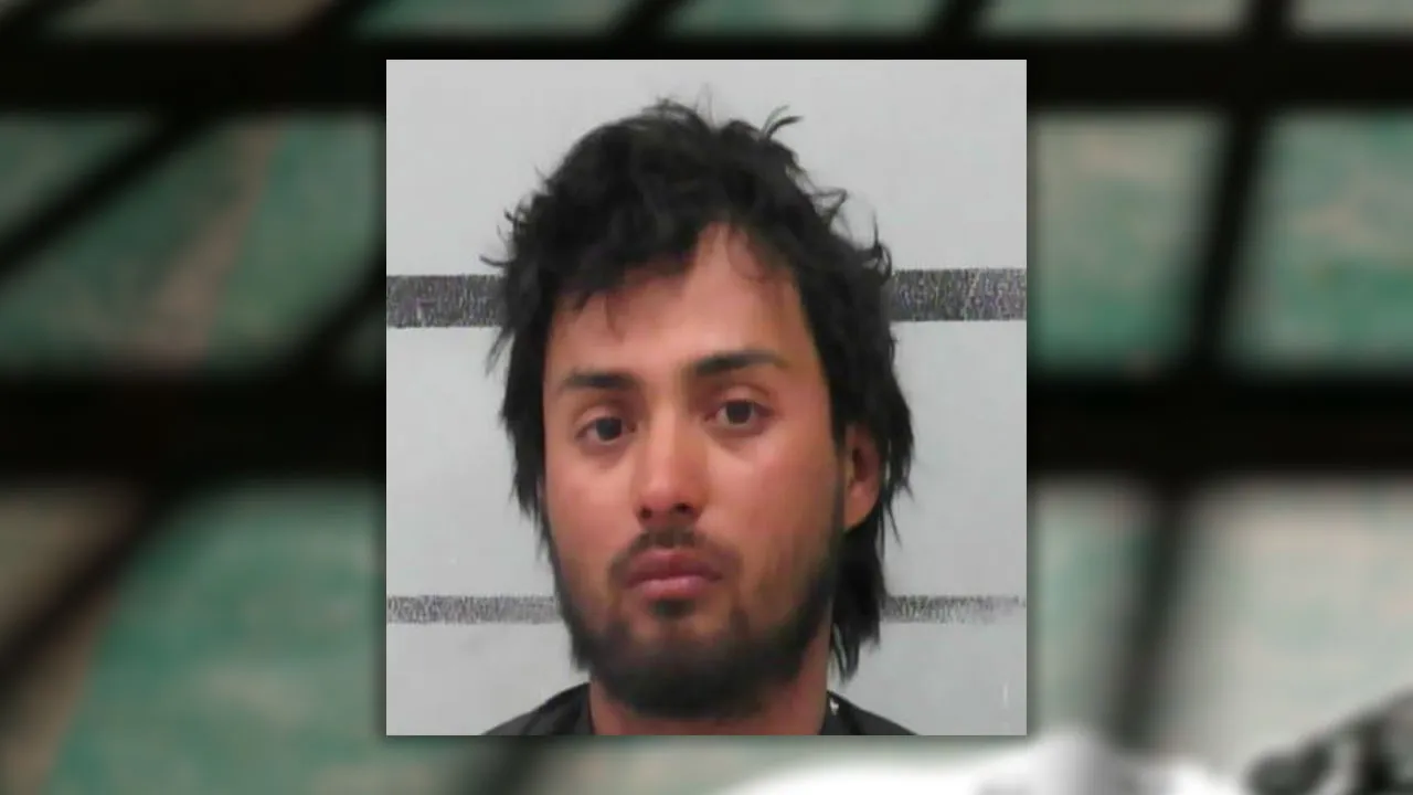 Alec Isaiah Banda’s mugshot, showcasing a masterclass in glassy-eyed indifference after allegedly treating a Lubbock intersection like a game of Grand Theft Auto.