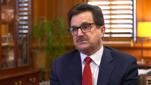 Texas Tech President Lawrence Schovanec sporting his finest "please don't take our football money" expression while wearing a tie that probably cost more than a graduate student’s monthly stipend.