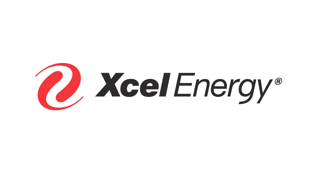 The Xcel Energy logo, a red swirl and black lettering, reminding you that the power grid is fragile and your gardening hobby is a threat to national security.