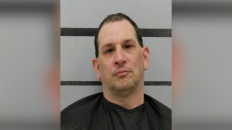 Mugshot of 48-year-old Robert Stevens against a gray background with black horizontal bars.